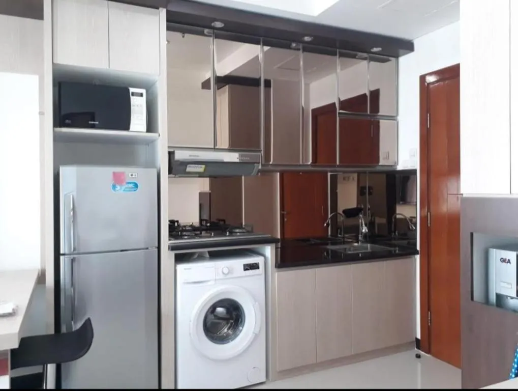 Cuisine entièrement équipée dans l'appartement 2 chambres au CENTeR JACARTa