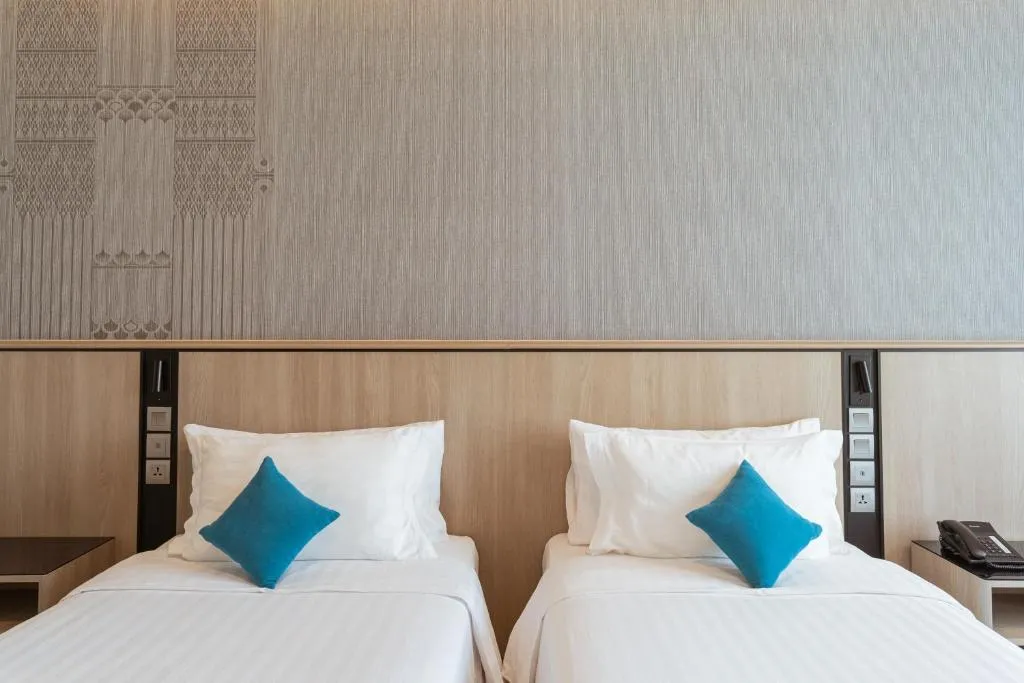 Zwillingsbett-Konfiguration im Centre Point Hotel Terminal21 Korat
