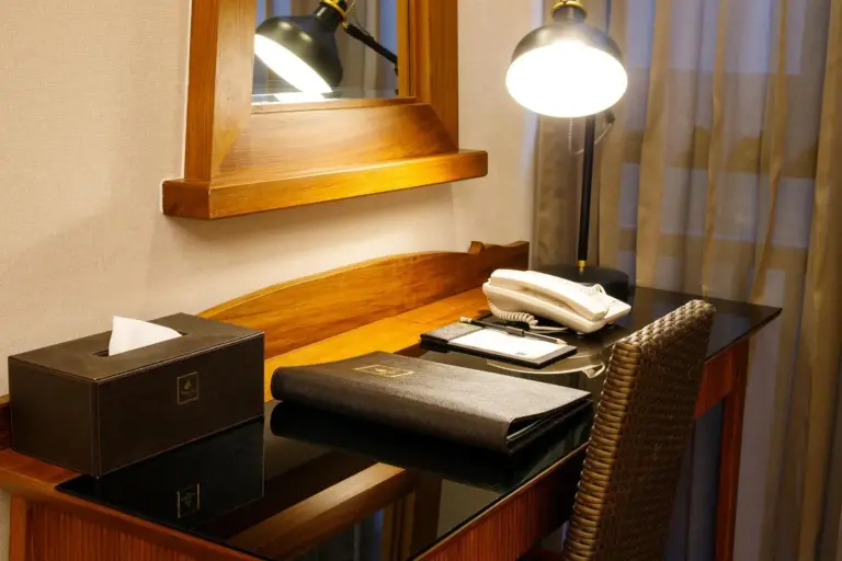 Chala Number 6 Hotel Chiang Mai desk and phone