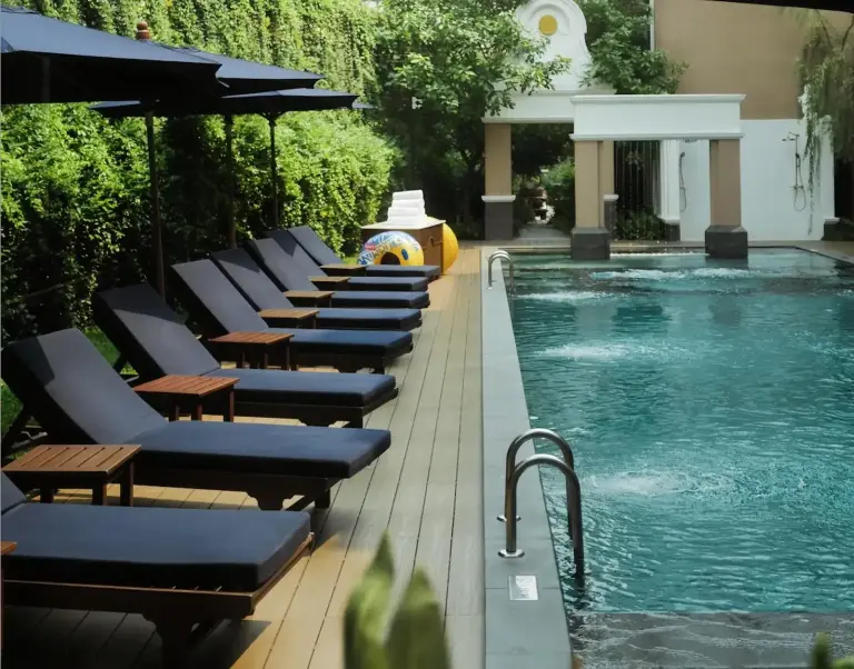 CHINO@NIMMAN Luxury Boutique Hotel poolside loungers