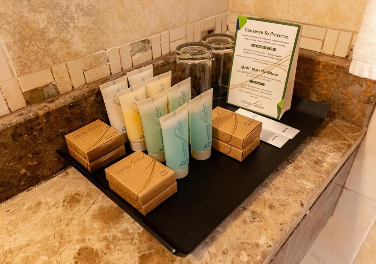 Toiletries and guest amenities displayed on a tray at City Premiere Hotel Apartments Dubai.