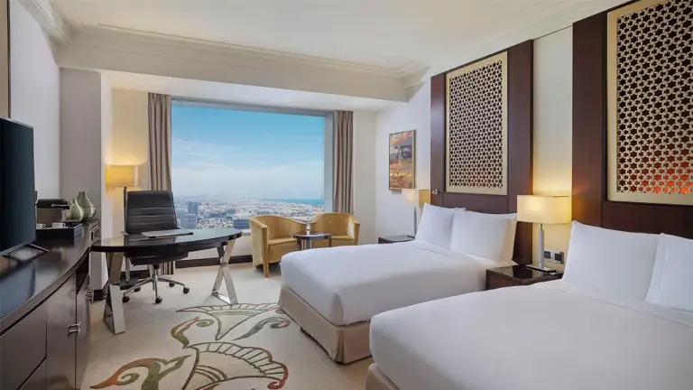 Twin room at Conrad Dubai with beautiful city view