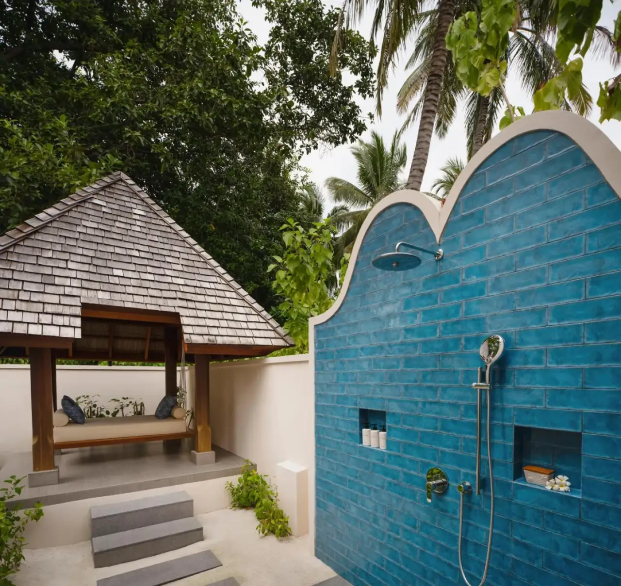 Zona de ducha exterior en Conrad Maldives Rangali Island
