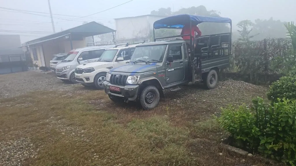 Cozy house in Bharatpur parking area with vehicles