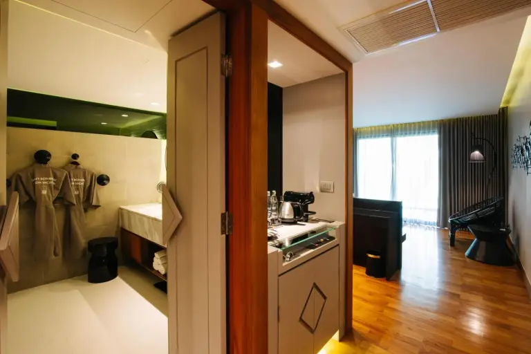 Bathroom and lounge area at Cross Chiang Mai Riverside