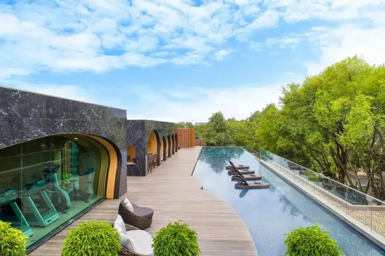 Infinity pool area at Cross Chiang Mai Riverside