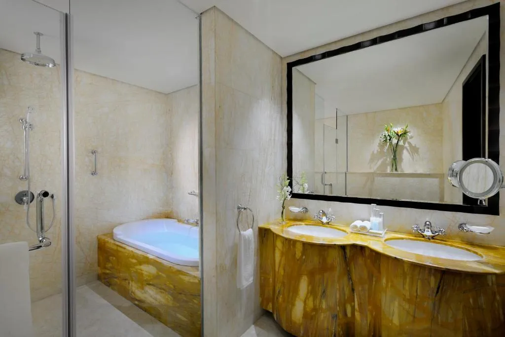 Luxurious bathroom with a bathtub at Crowne Plaza Dubai Jumeirah