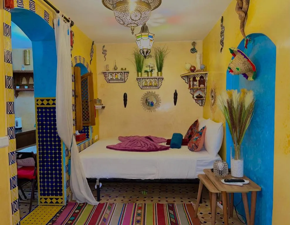 Dar Sandra Moroccan Tiny House cozy bedroom with decorative elements