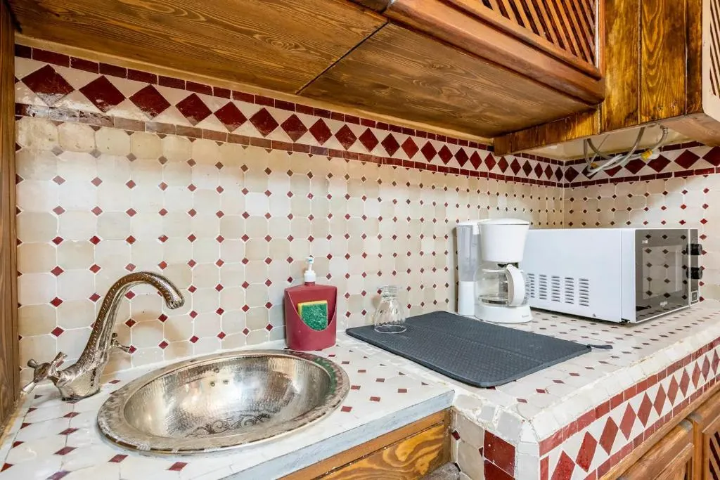 Dar Sandra Moroccan Tiny House kitchenette with traditional Moroccan sink