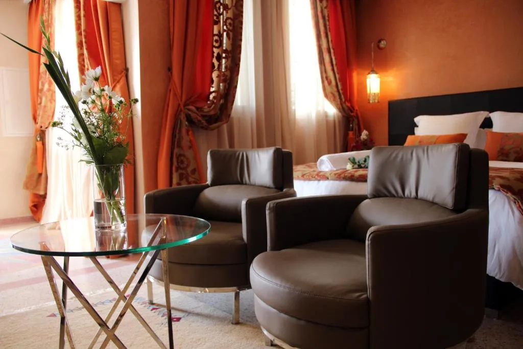 Comfortable sitting area in a bedroom at Dar Souran, Tangier