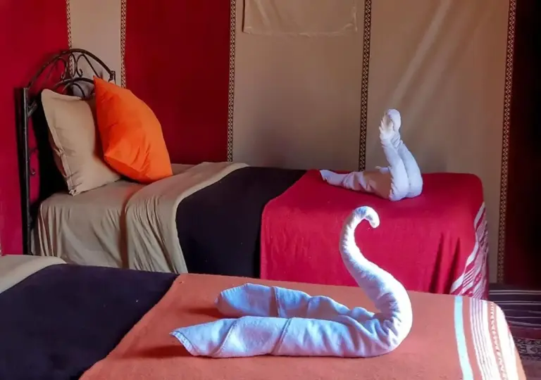 Decorated bedroom at Desert Life Camp in Merzouga