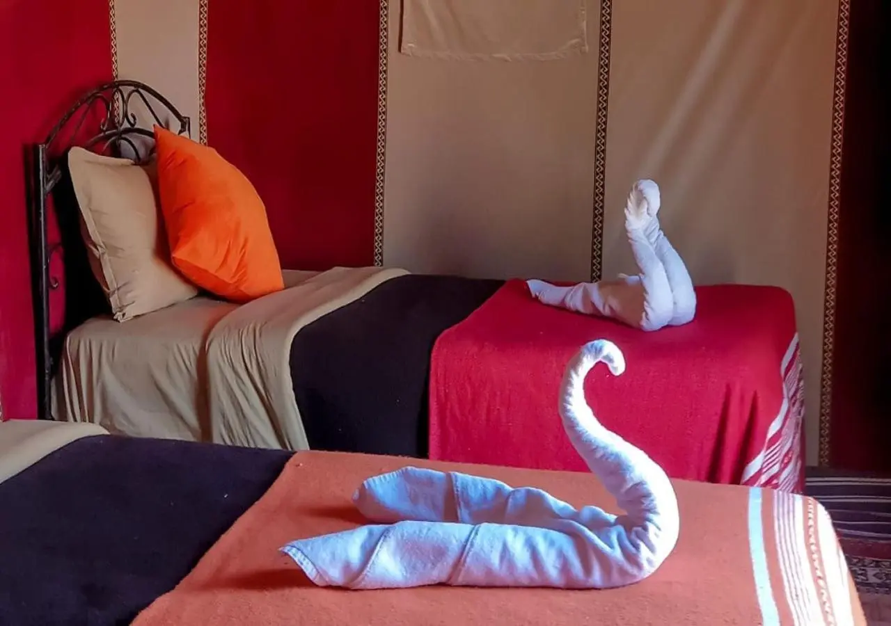 Decorated bedroom at Desert Life Camp in Merzouga