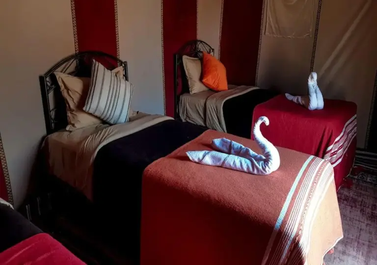 Relaxing bedroom at Desert Life Camp in Merzouga