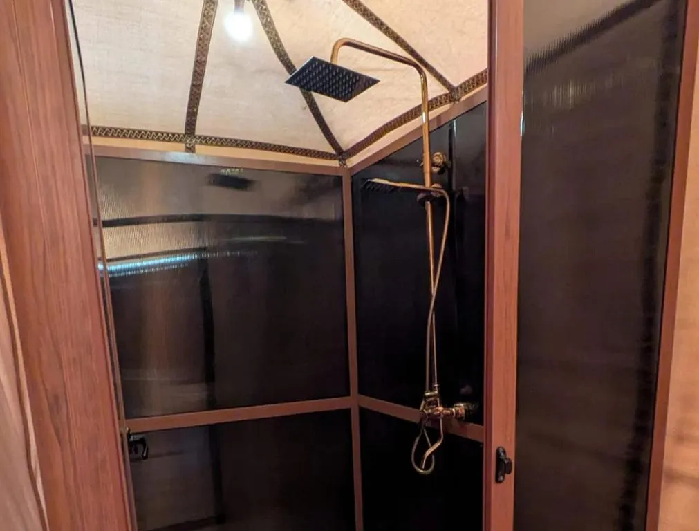Shower area in tent at Desert Nights Camp