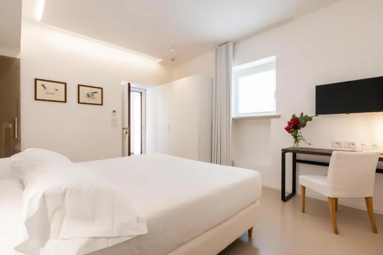 Interior de la habitación de huésped en Dimora Caiammari Luxury Hotel & Spa