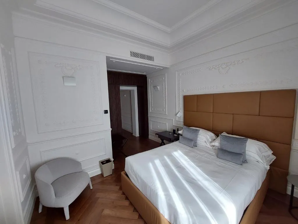 Cozy bedroom at Dimora Palanca Boutique & SPA in Florence