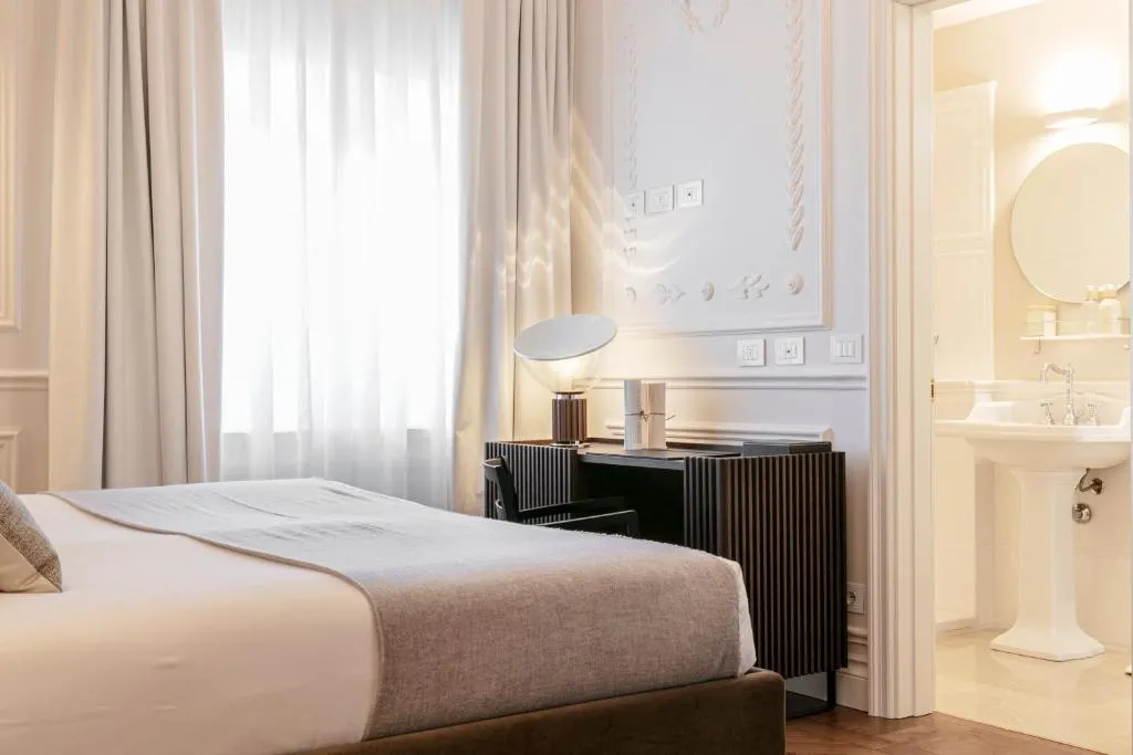 Spacious bedroom setup at Dimora Palanca Boutique & SPA