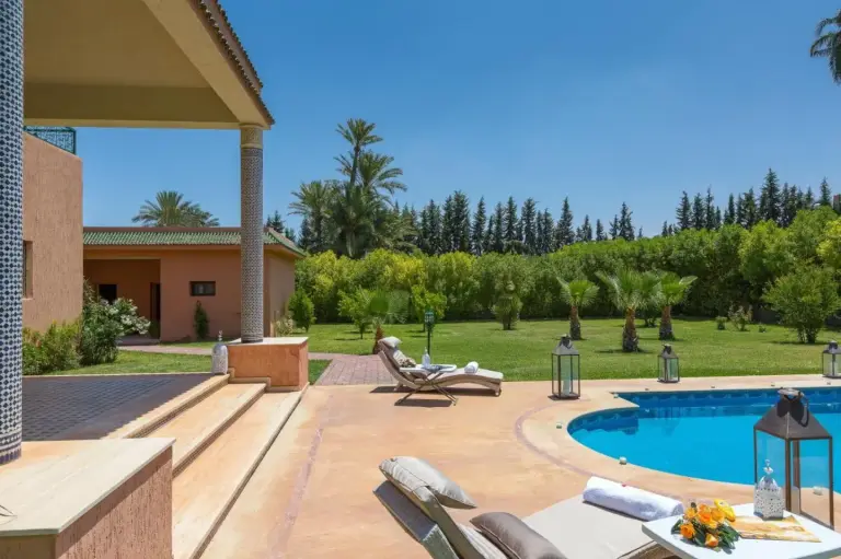 Lounge chairs by the pool at Domaine Rosaroum