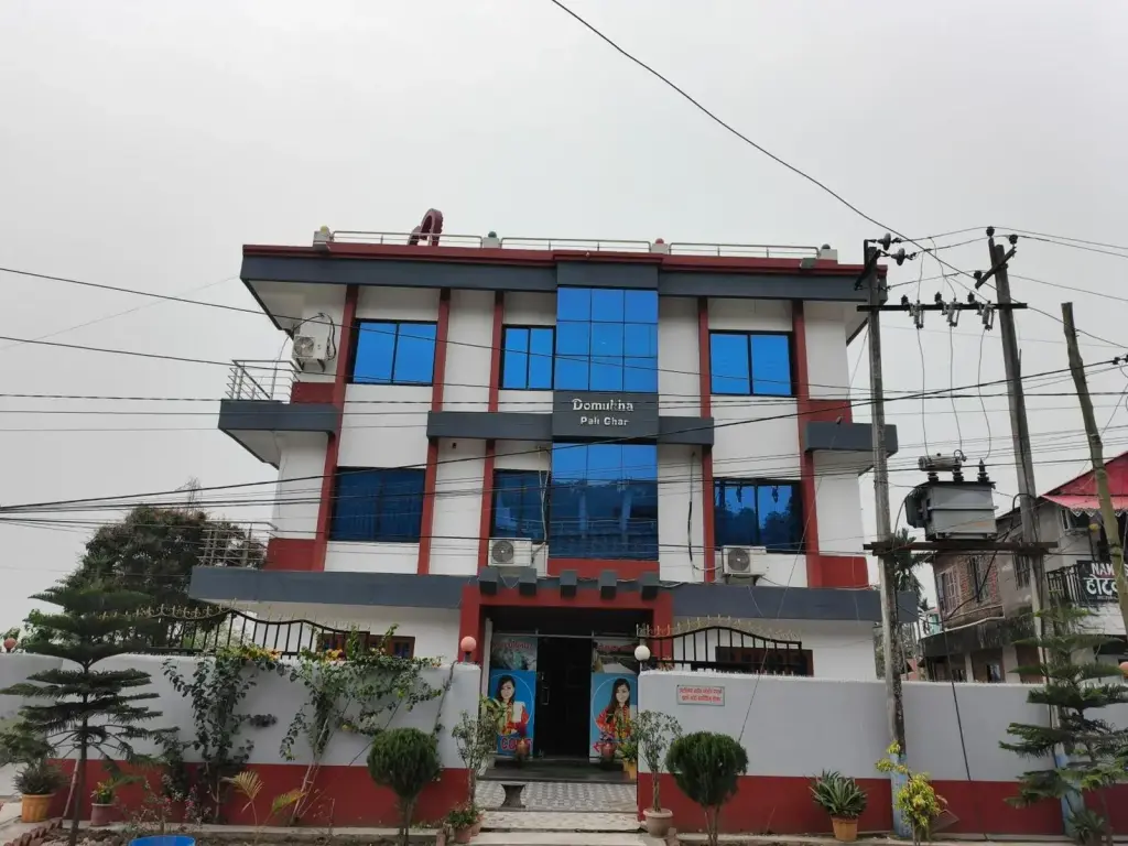 Domukha Pali Ghar hotel exterior in Birtamod with a modern multi-story facade and front entrance.