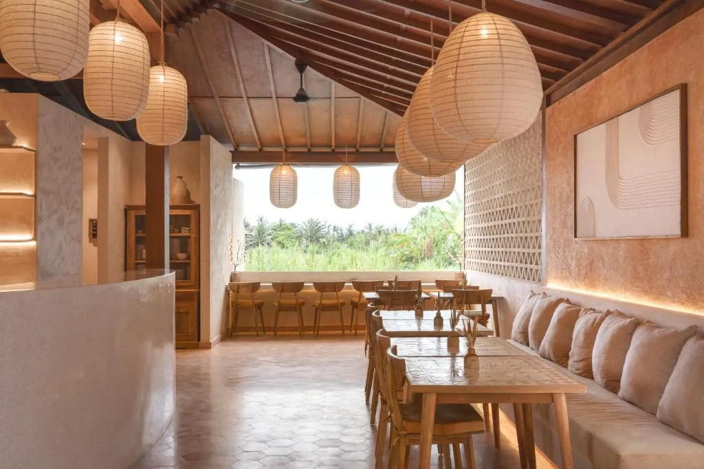 Bright dining space at Dune Seseh with a view