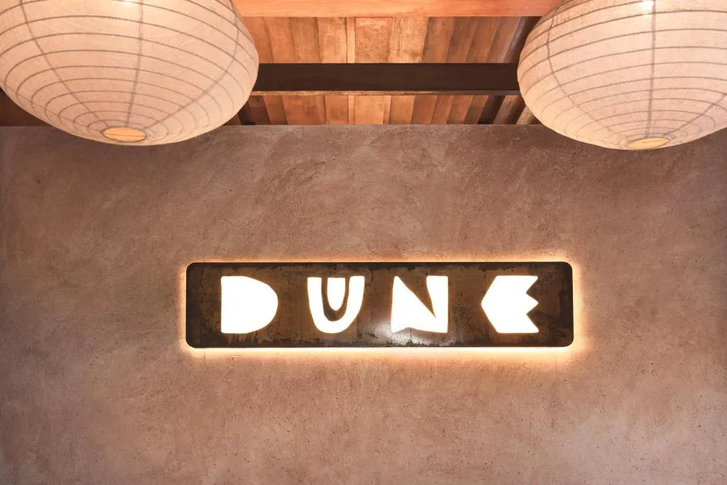 Dune Seseh illuminated sign at reception