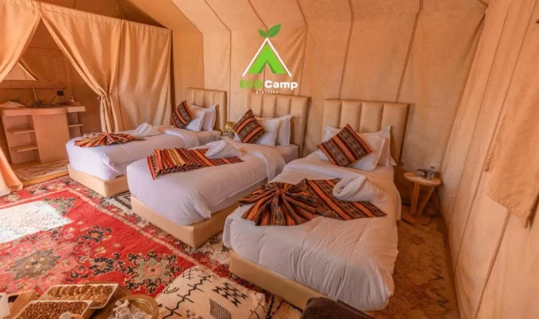 Eco Desert Camp triple room with colorful decor.