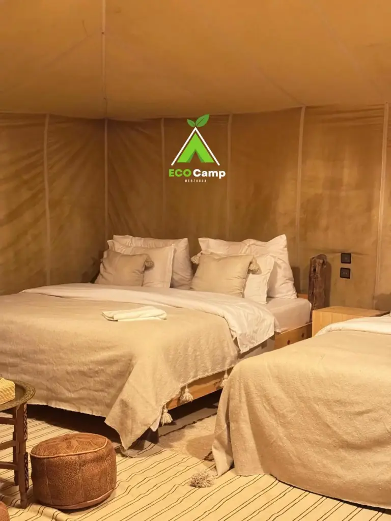 Eco Desert Camp twin bedroom with soft linens.