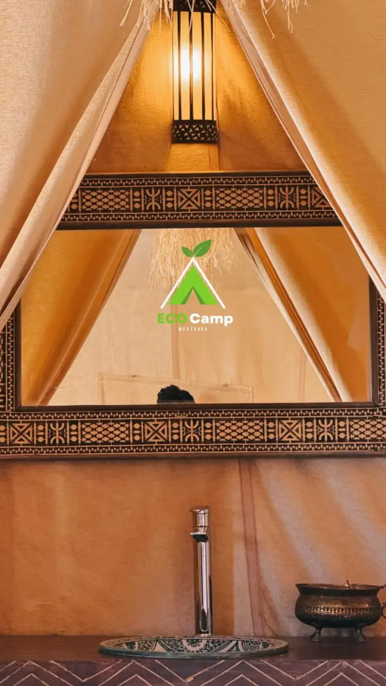 Eco Desert Camp vanity mirror with ornate design.