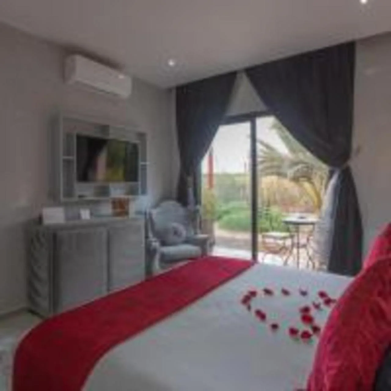 Eden Lodges & SPA-Boutique Hôtel de Luxe Zimmer mit Gartenblick