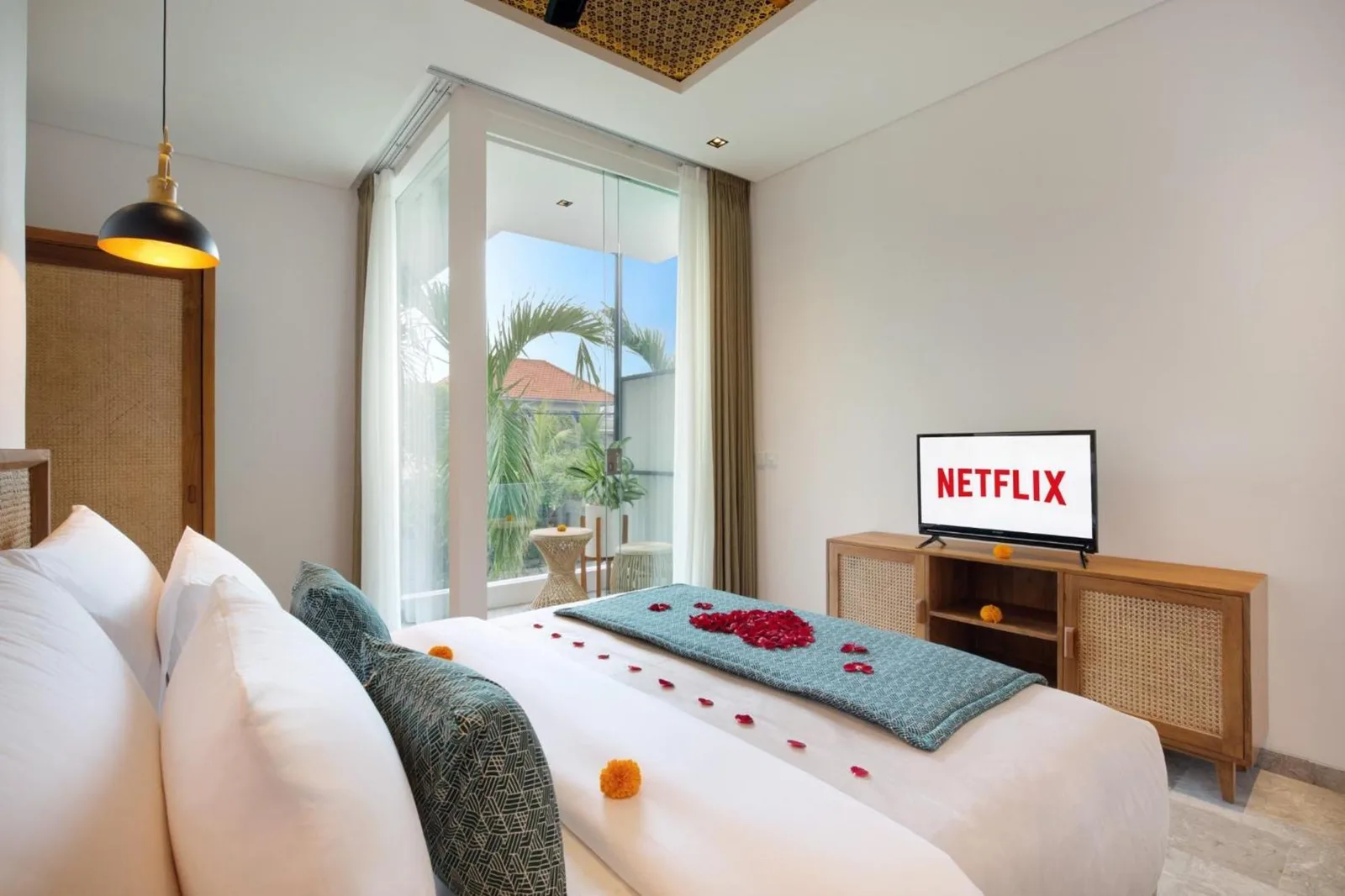 Eight Palms Villa Seminyak by Ini Vie Hospitality – Seminyak, Indonesia hotel – a living room with a couch and a table at Eight Palms Villa Seminyak by Ini Vie Hospitality in Seminyak
