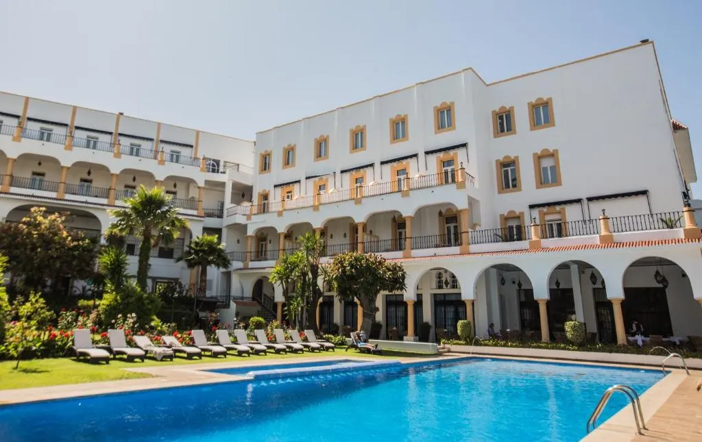 Exterior view of El Minzah Hotel with swimming pool in Tangier
