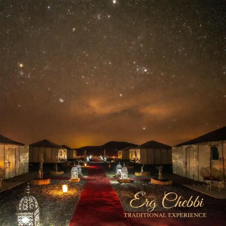 Erg Chebbi Traditional Experience & Activities in Merzouga desert camp exterior under a starry night sky