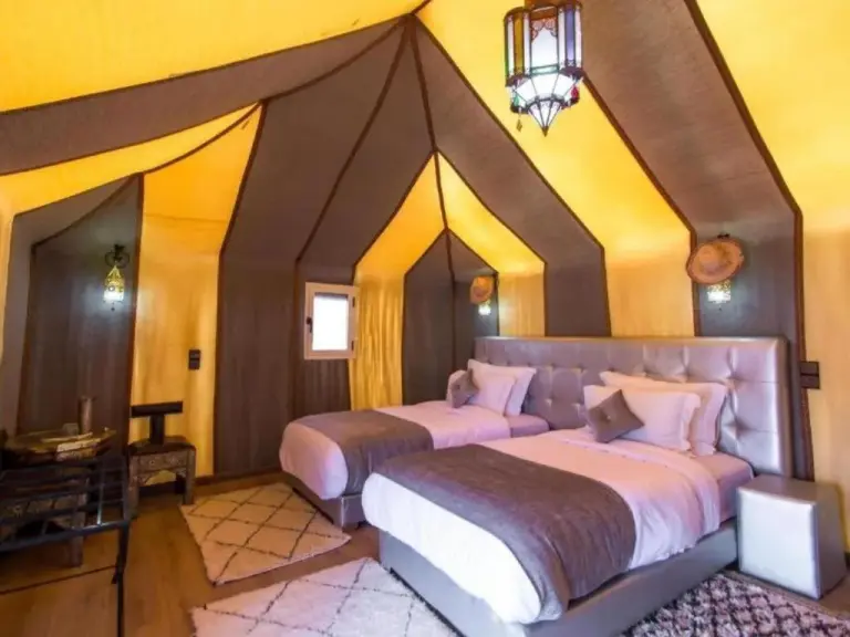 Erg Chebbi Traditional Experience & Activities in Merzouga twin tent interior with modern desert lodge design
