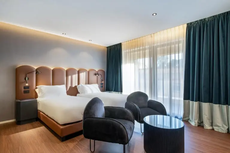 Eurostars Matera La Suite twin room with modern decor