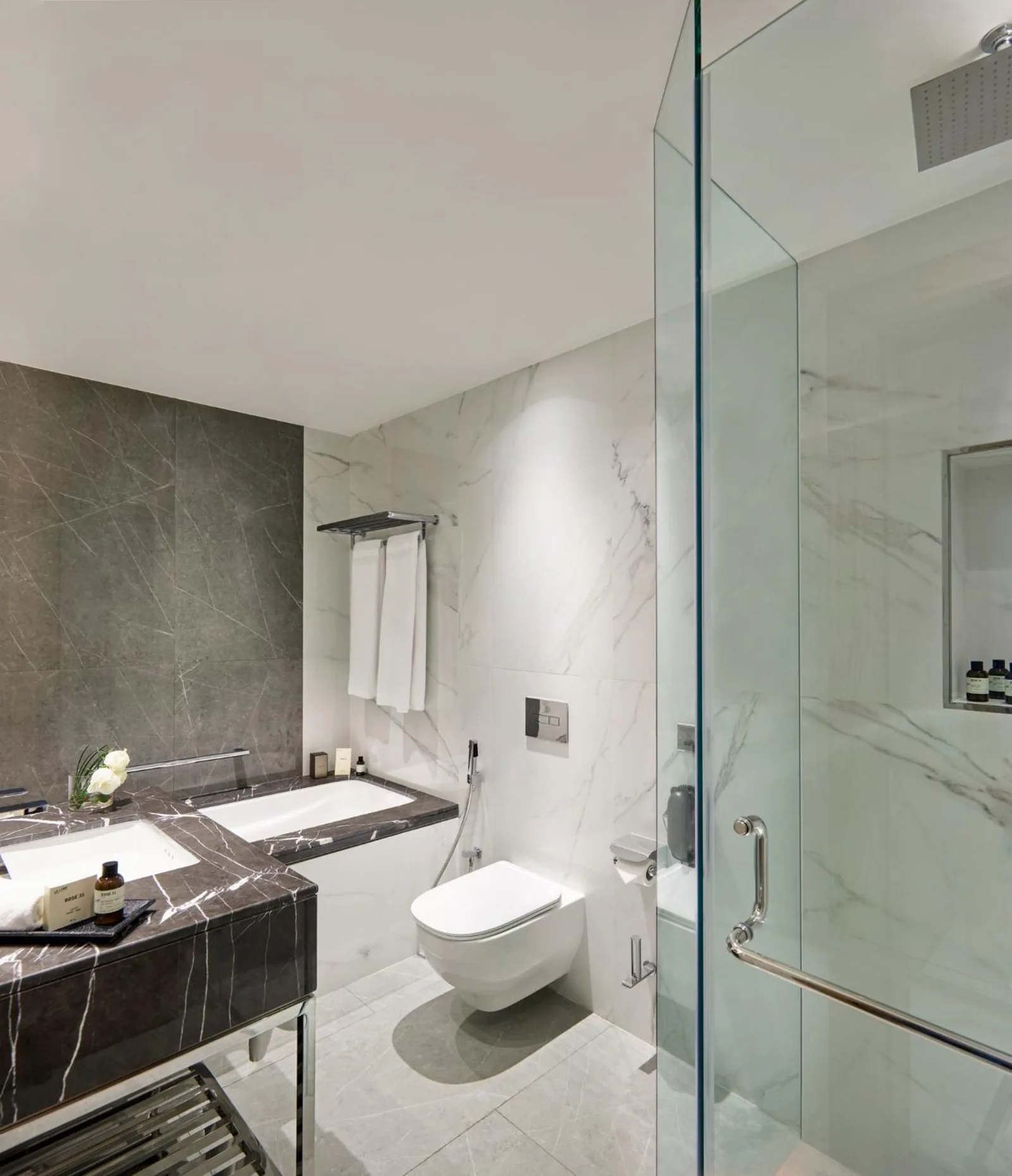 Modern bathroom with glass shower in Fairmont Dubai