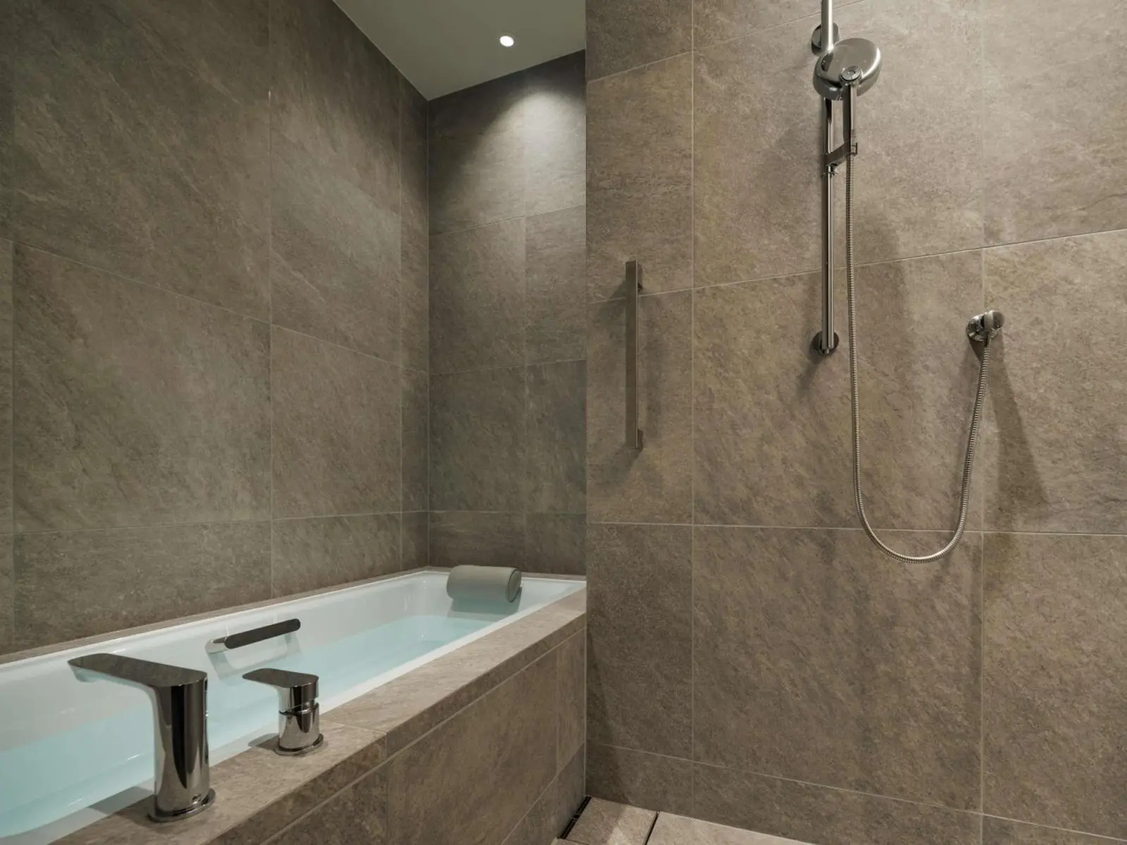 Shower area with modern design at Fairmont Tokyo
