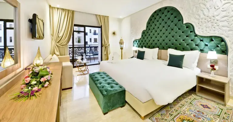 Fes Heritage Boutique Hotel luxury suite with green decor