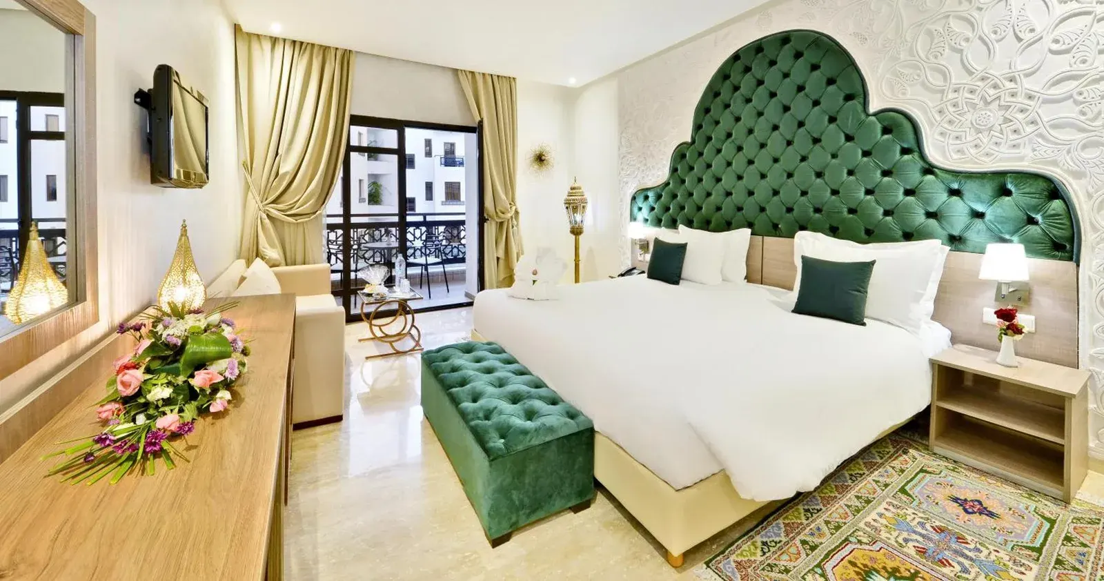 Fes Heritage Boutique Hotel luxury suite with green decor