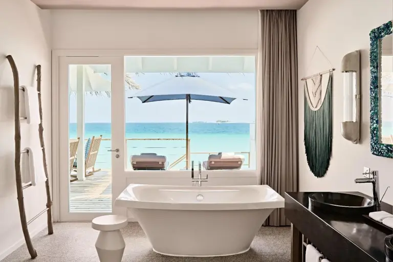 Bathroom with a view at Finolhu, A Seaside Collection Resort.