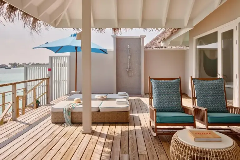 Private deck area of a villa at Finolhu, A Seaside Collection Resort.