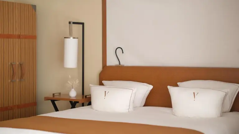 Elegant bed setup at Five Seas by Inwood Hotels in Cannes
