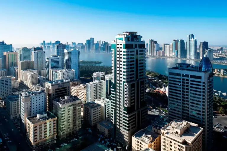 Aerial skyline view from Four Points by Sheraton Sharjah showing Sharjah towers and waterfront.