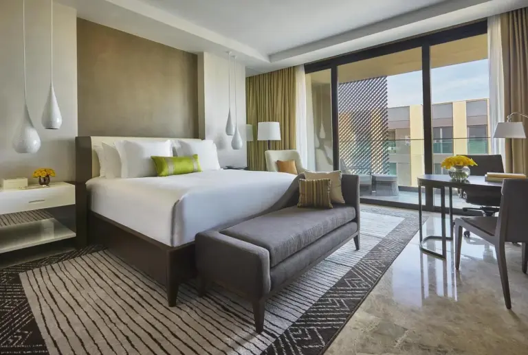 Modern guest room at the Four Seasons Hotel Casablanca with a balcony