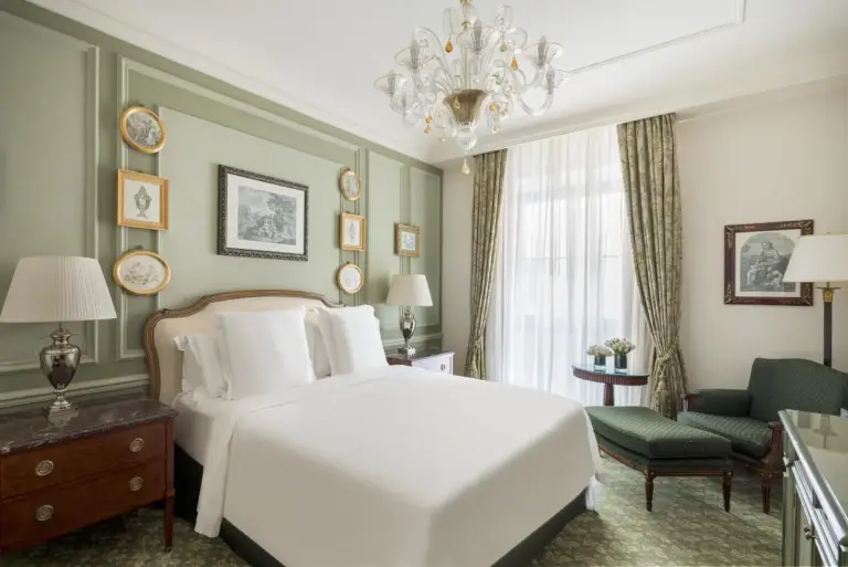 Four Seasons Hotel Firenze sophisticated guest room with bed