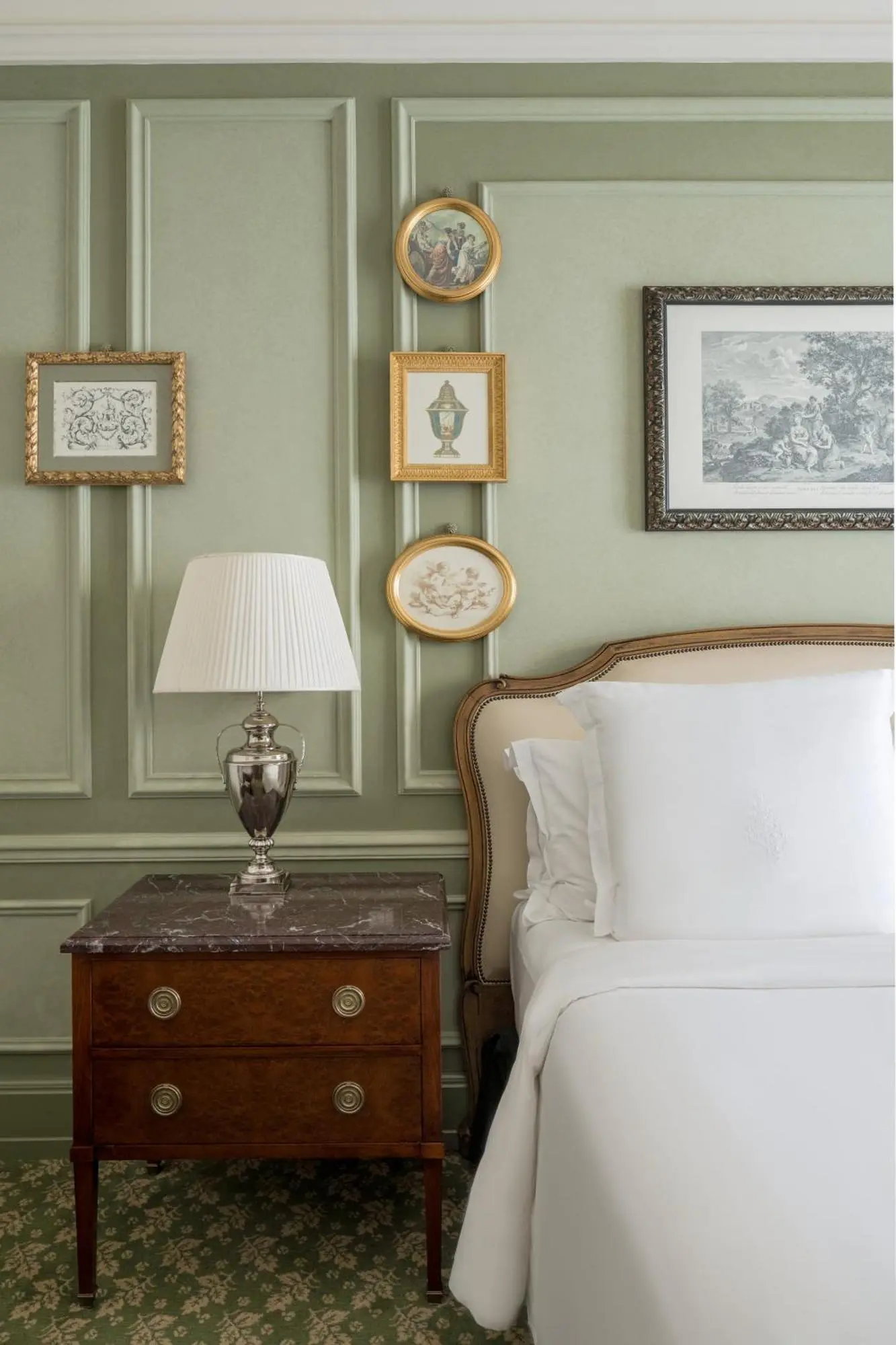 Four Seasons Hotel Firenze elegant room decor with paintings