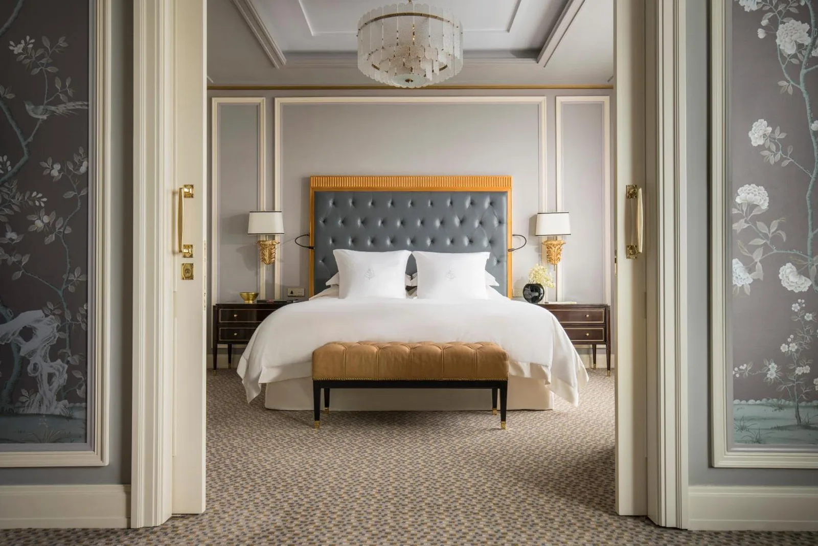 Elegant bedroom at Four Seasons Hotel Jakarta with plush bedding