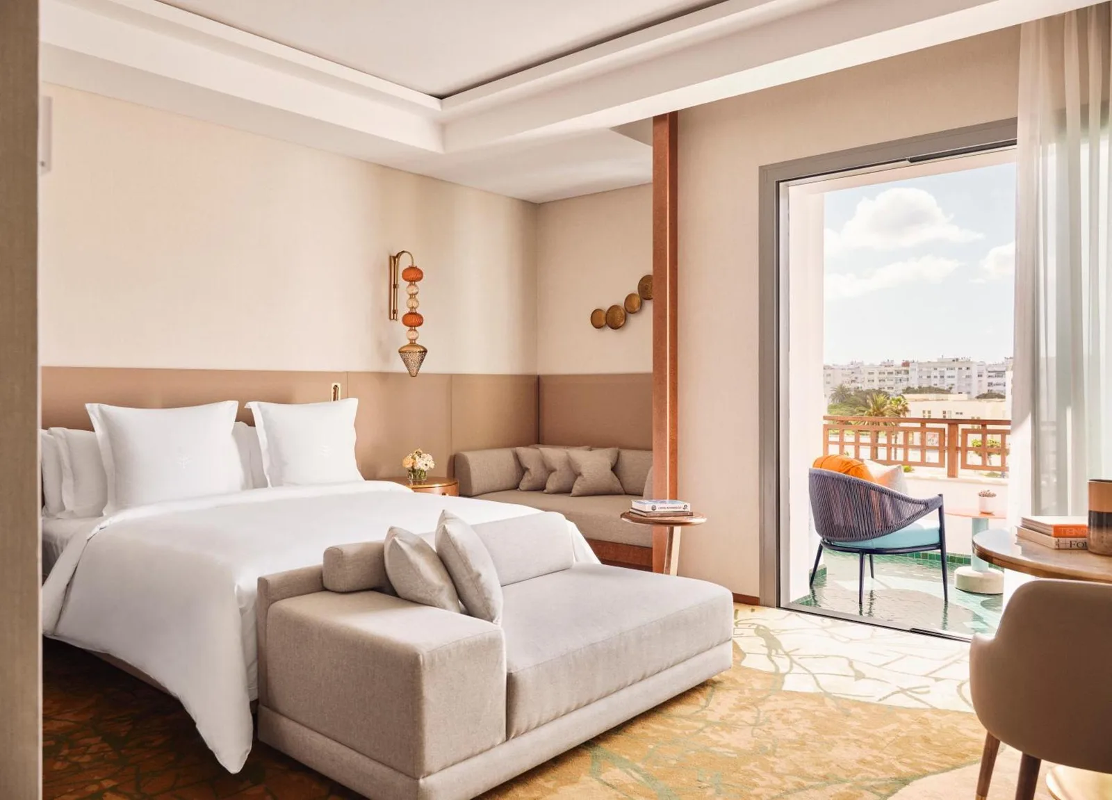 Luxurious guest room at Four Seasons Hotel Rabat with comfy bed and seating
