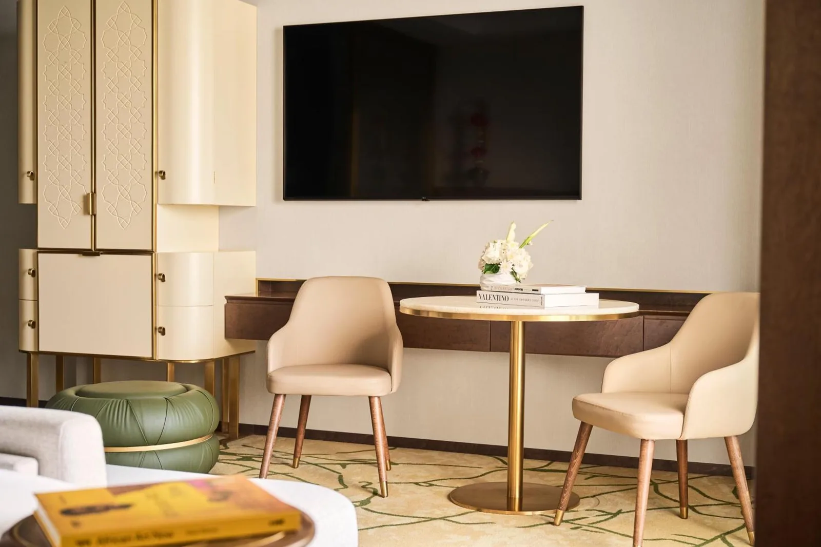 Stylish room interior at Four Seasons Hotel Rabat featuring a television and seating area