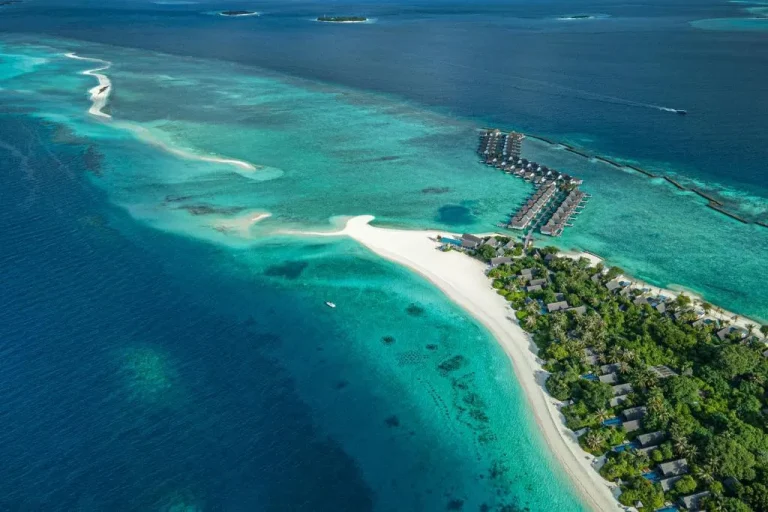 Aerial view of Four Seasons Resort Maldives at Landaa Giraavaru showing stunning turquoise waters