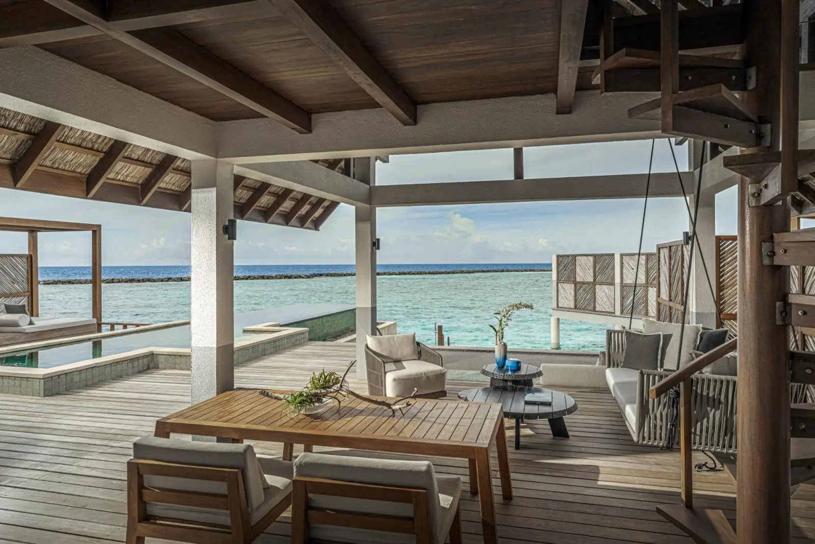 Outdoor living space at Four Seasons Resort Maldives at Landaa Giraavaru